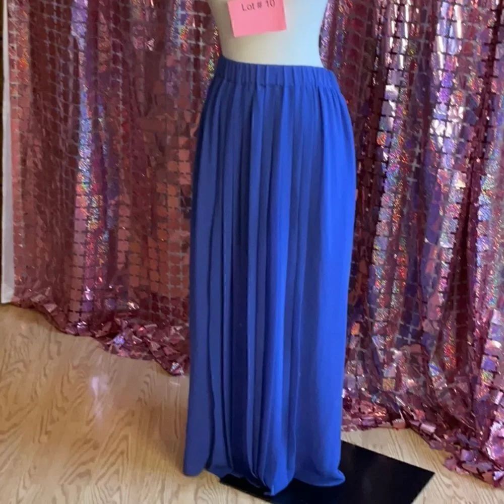 NWOT pleated front skirt in lightweight polyester, purple colored in small